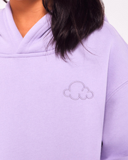 Close-up of the lavender Kids Cloud pullover fabric and embroidered cloud logo