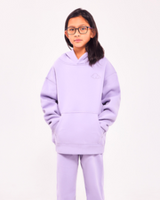 Kids Cloud pullover in lavender showing the roomy kangaroo pocket