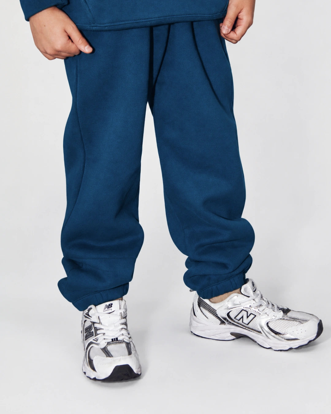 Soothe kids sweatpants in Denim Blue - Front view